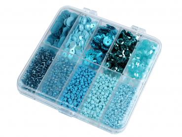 Set of seed beads and sequins in blue tones in a plastic box